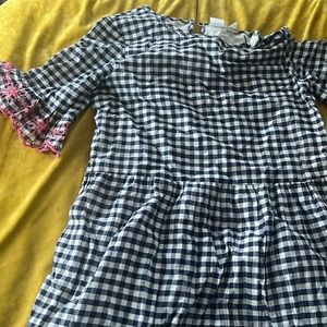 Blue gingham with pink embroidered scalloped sleeves and hemline